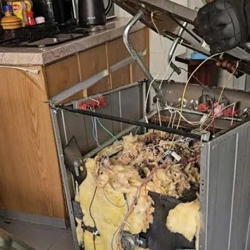 Cooker opened with insulation exposed during repair