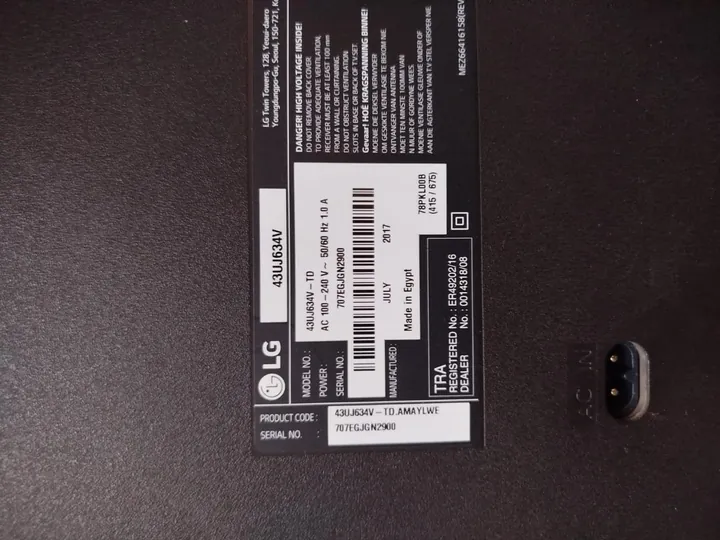 LG TV rating plate on the back cover