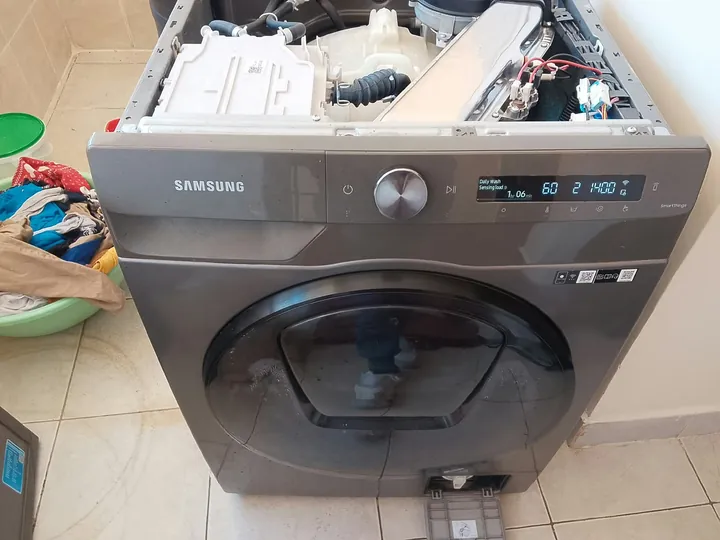 Samsung front-load washing machine with the top panel removed