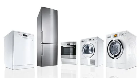 Dishwasher, fridge, built-in oven, tumble dryer and washing machine side by side