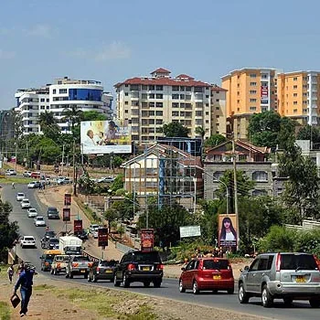 Street in Nairobi with apartments and traffic